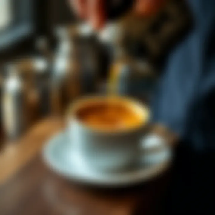 Artisan coffee being poured into a beautifully crafted cup